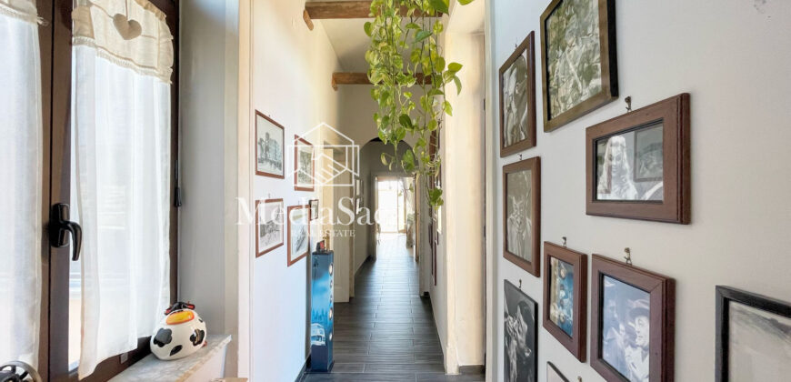 Casa con terrazzo