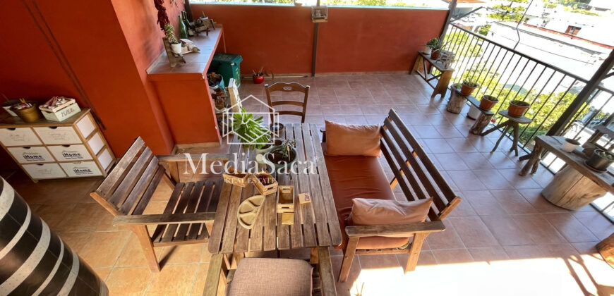 Casa con terrazzo
