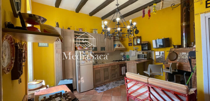Casa con terrazzo