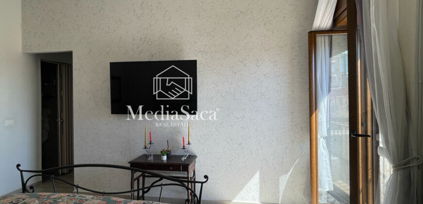 Casa con terrazzo